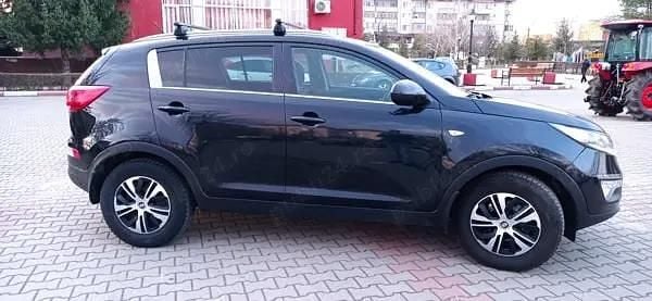 Negru Utilizat 2014 Kia Sportage SUV | 12.950 EUR (Puțin scump) - Imagine 1/4