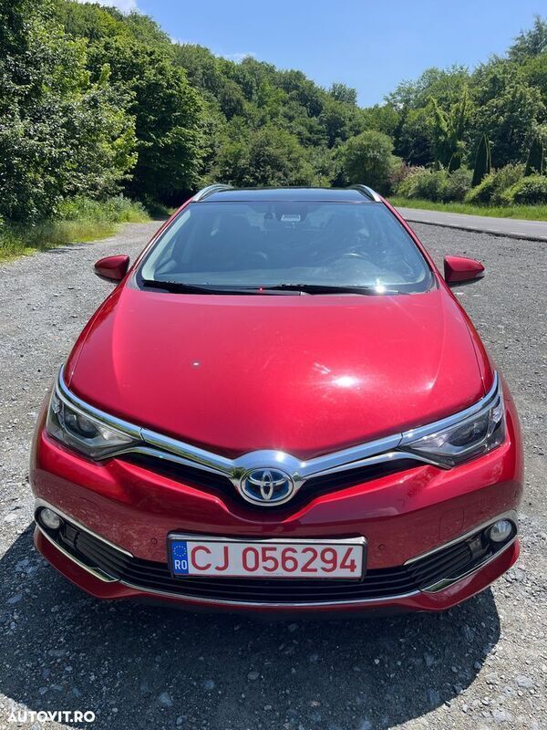 Rosu Utilizat 2015 Toyota Auris Hybrid Edition-S Break | 10.999 EUR (Preț OK) - Imagine 1/4