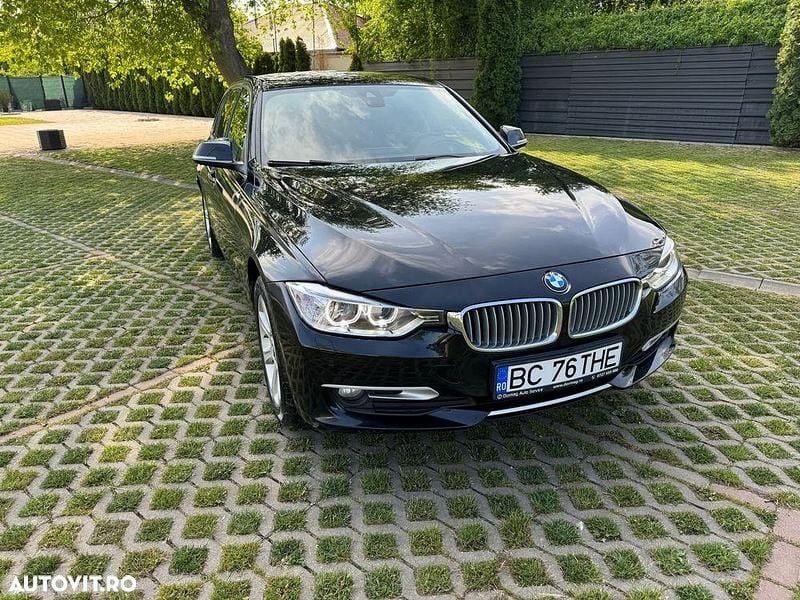 Negru Utilizat 2014 BMW 320 Sport Line Break | 9.390 EUR (Super Preț) - Imagine 1/4