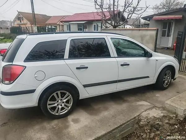 Second-hand Opel Astra 110 CP (80 kW) 2008 Alb Monovolum
