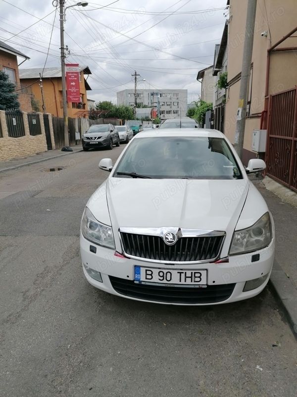 Alb Utilizat 2011 Skoda Octavia Berlinǎ | 4.300 EUR (Super Preț) - Imagine 1/4