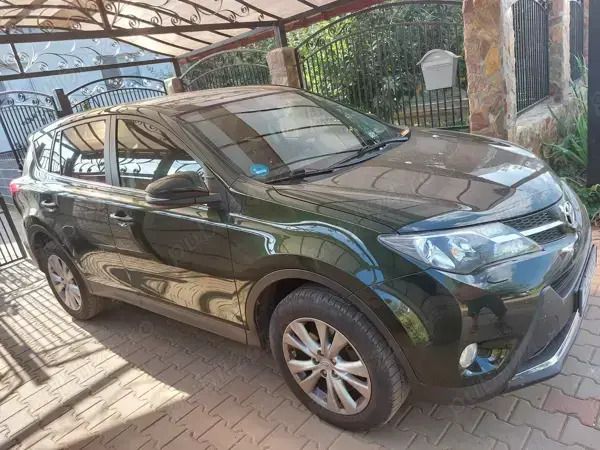 Verde Utilizat 2013 Toyota RAV4 SUV | 12.385 EUR (Puțin scump) - Imagine 1/4