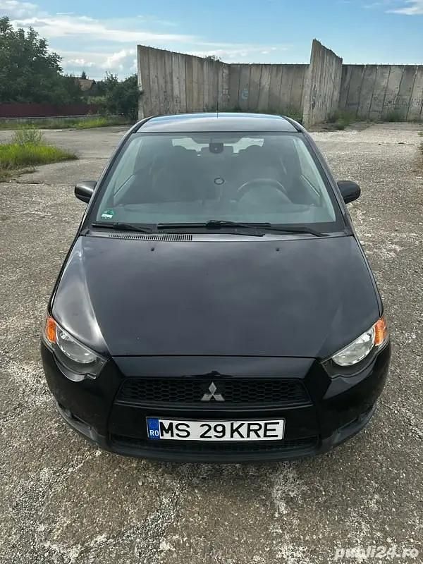 Second-hand Mitsubishi Colt 111 CP (81 kW) 2009 Negru Coupe