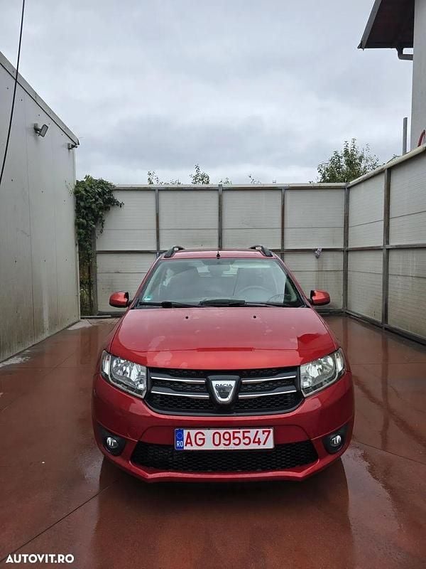Culoarerosu Utilizat 2015 Dacia Logan MCV Prestige Break | 4.700 EUR (Preț bun) - Imagine 1/4