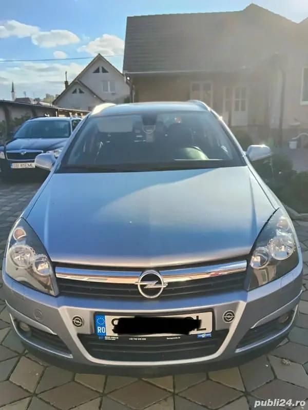 Argintiu Utilizat 2007 Opel Astra Break | 1.550 EUR (Preț OK) - Imagine 1/4