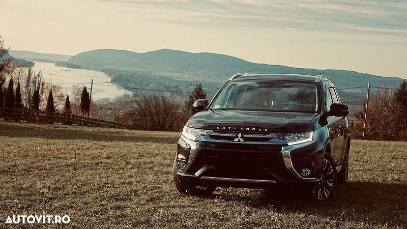 Negru Utilizat 2017 Mitsubishi Outlander P-HEV Top SUV | 16.850 EUR (Puțin scump) - Imagine 1/4