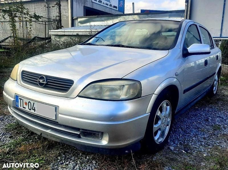 Culoareargint Utilizat 2004 Opel Astra Hatchback | 1.199 EUR (Super Preț) - Imagine 1/4