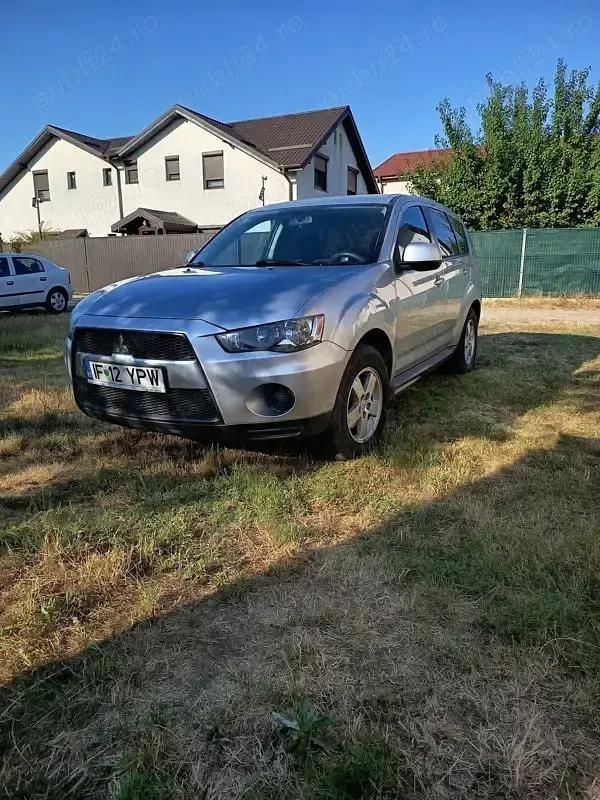 Argintiu Utilizat 2012 Mitsubishi Outlander SUV | 7.200 EUR - Imagine 1/4