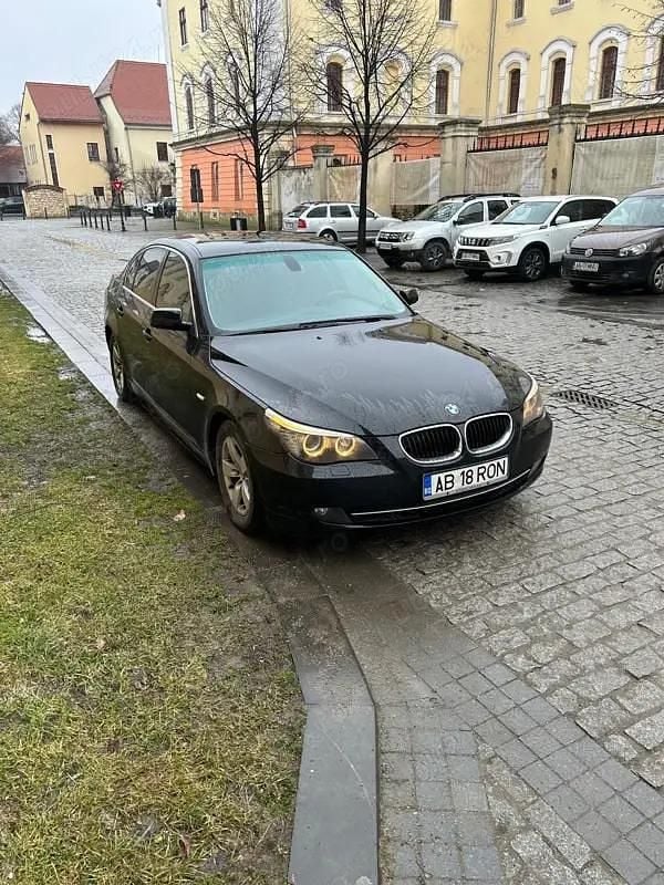 Second-hand BMW 520 177 CP (130 kW) 2009 Negru Berlinǎ