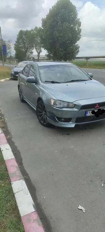 Gri Utilizat 2008 Mitsubishi Lancer Instyle Berlinǎ | 3.850 EUR - Imagine 1/4