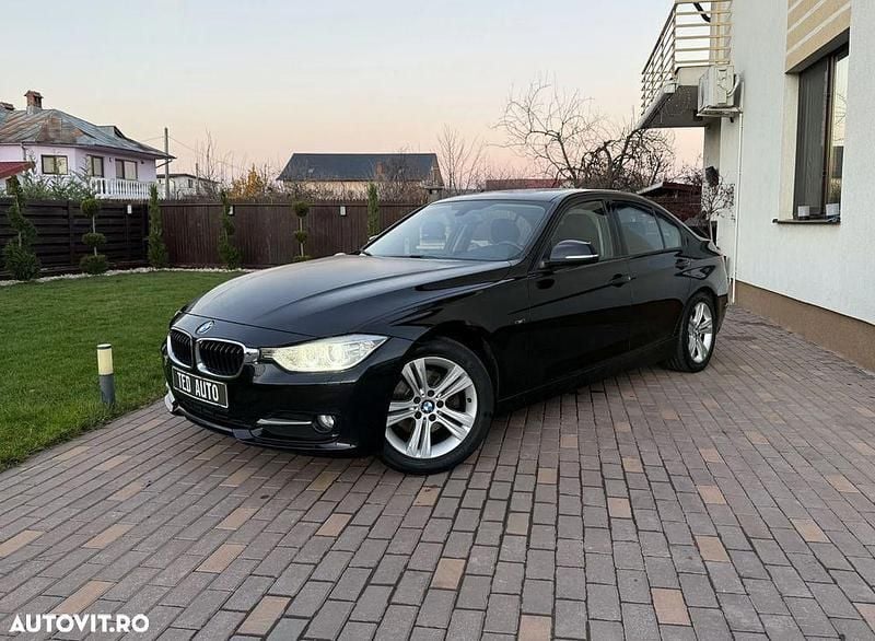 Culoarenegru Utilizat 2012 BMW 320 Sport Line Berlinǎ | 9.490 EUR (Super Preț) - Imagine 1/4