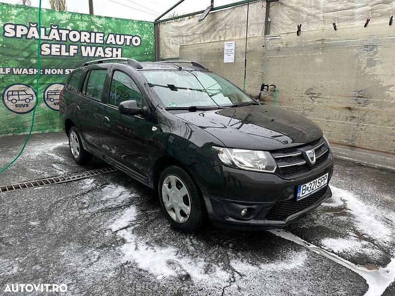 Culoarenegru Utilizat 2014 Dacia Logan MCV Lauréate Break | 3.990 EUR - Imagine 1/4