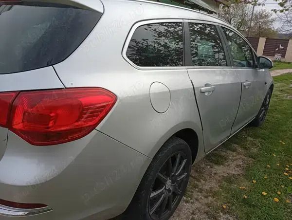 Second-hand Opel Astra 136 CP (100 kW) 2014 Gri Break