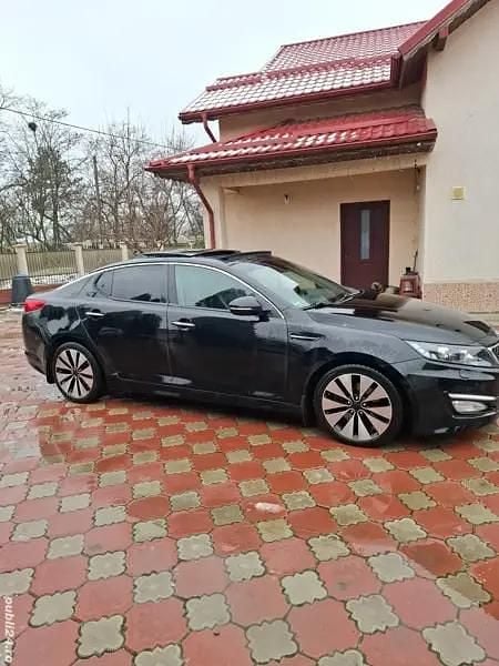 Second-hand Kia Optima 136 CP (100 kW) 2012 Negru Berlinǎ