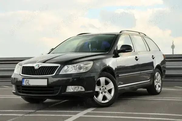 Negru Utilizat 2013 Skoda Octavia Hatchback | 5.000 EUR (Preț bun) - Imagine 1/4