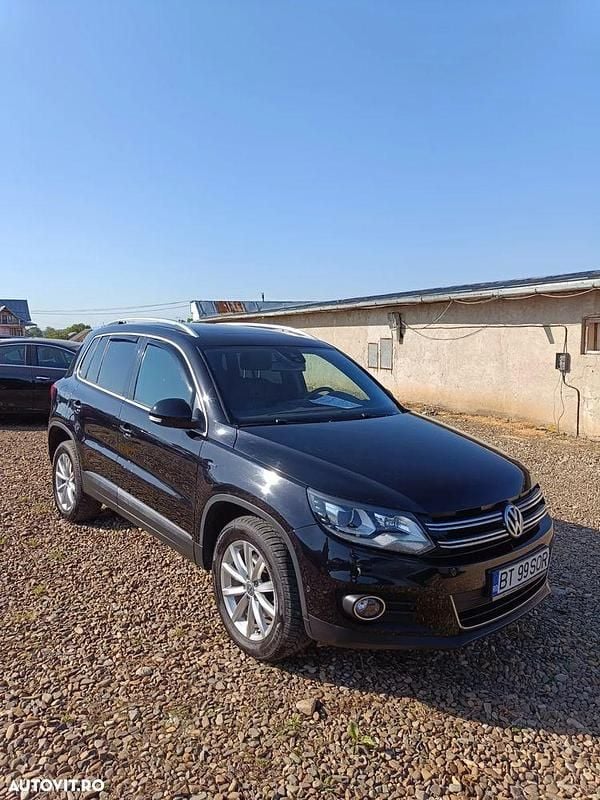 Culoarenegru Utilizat 2016 VW Tiguan SUV | 13.400 EUR (Preț OK) - Imagine 1/4