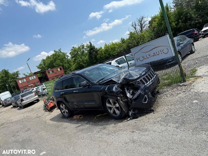 Gri Utilizat 2014 Jeep Grand Cherokee Overland SUV | 6.915 EUR - Imagine 1/4