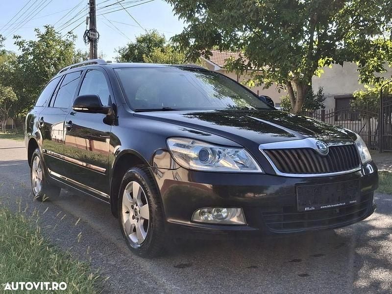 Culoarenegru Utilizat 2012 Skoda Octavia Elegance Break | 3.450 EUR (Super Preț) - Imagine 1/4