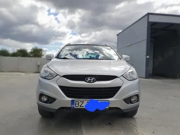 Gri Utilizat 2011 Hyundai ix35 SUV | 7.500 EUR (Preț OK) - Imagine 1/4