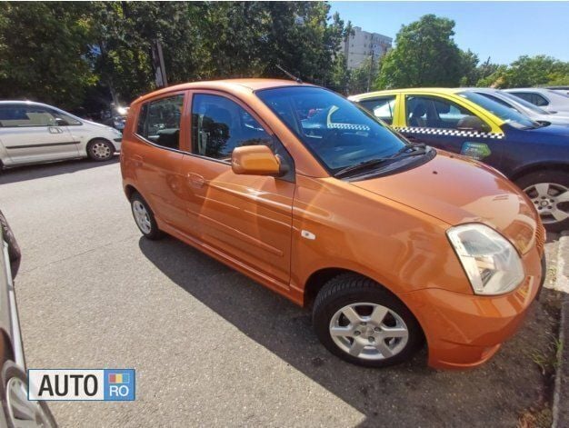 Second-hand Kia Picanto 65 CP (47 kW) 2006 Portocaliu Hatchback