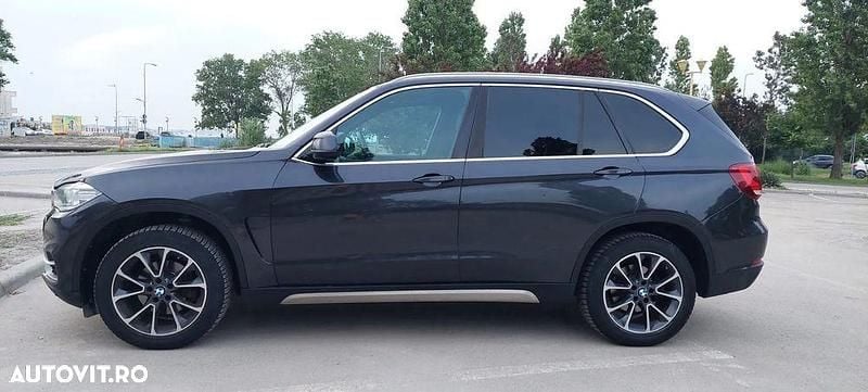 Culoarenegru Utilizat 2015 BMW X5 SUV | 17.500 EUR (Super Preț) - Imagine 1/4