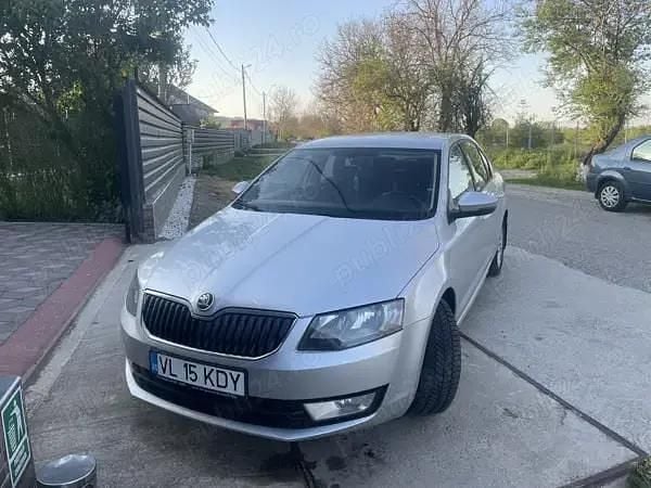 Argintiu Second-hand 2017 Skoda Octavia Berlinǎ | 7.500 EUR (Preț bun) - Imagine 1/4