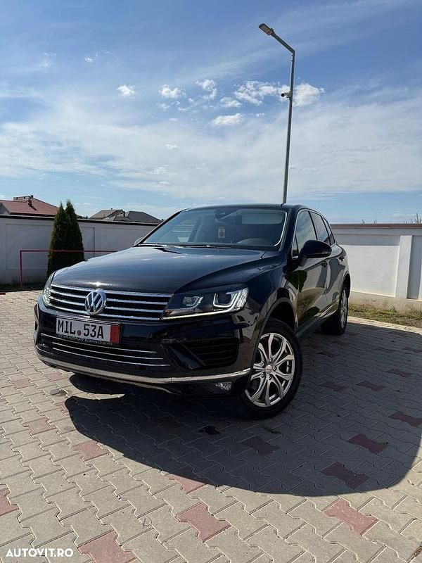 Culoarenegru Utilizat 2016 VW Touareg SUV | 19.900 EUR (Preț bun) - Imagine 1/4