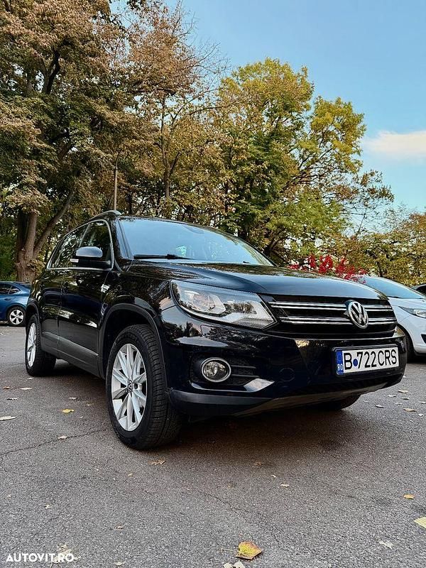 Culoarenegru Utilizat 2014 VW Tiguan Track & Field SUV | 12.000 EUR (Preț OK) - Imagine 1/4