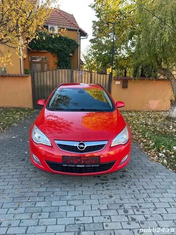 Rosu Utilizat 2011 Opel Astra Break | 3.550 EUR (Preț OK) - Imagine 1/4