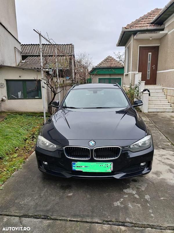 Culoarenegru Utilizat 2014 BMW 318 Break | 7.500 EUR (Preț OK) - Imagine 1/4