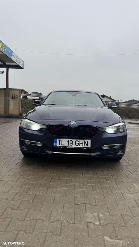 Culoarealbastru Utilizat 2014 BMW 318 Berlinǎ | 11.000 EUR (Preț OK) - Imagine 1/4