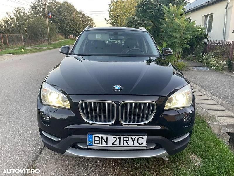 Culoarenegru Utilizat 2013 BMW X1 xLine SUV | 8.700 EUR (Preț bun) - Imagine 1/4