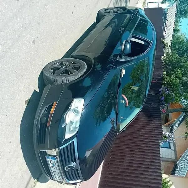 Second-hand VW Passat 105 CP (77 kW) 2006 Negru Berlinǎ