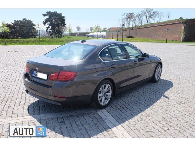 Second-hand BMW 520 Sport Line 170 CP (125 kW) 2012 Maro metalizat Berlinǎ