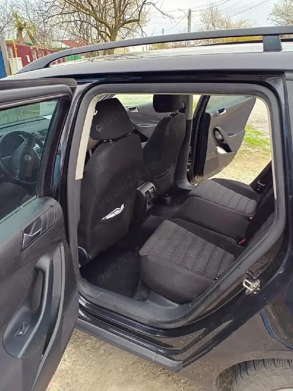 Second-hand VW Passat 103 CP (75 kW) 2009 Negru Berlinǎ