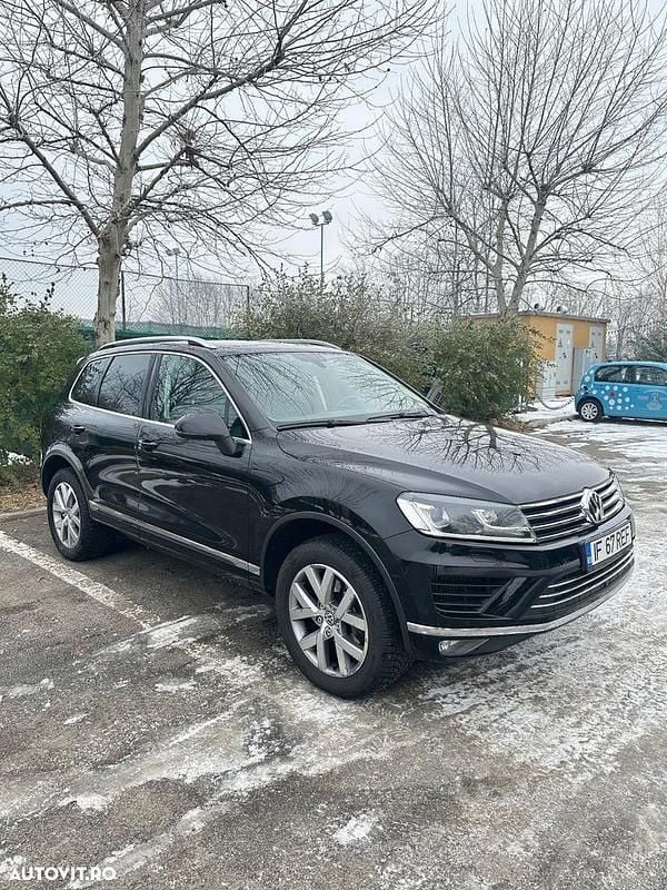 Culoarenegru Utilizat 2014 VW Touareg SUV | 15.990 EUR (Preț bun) - Imagine 1/4