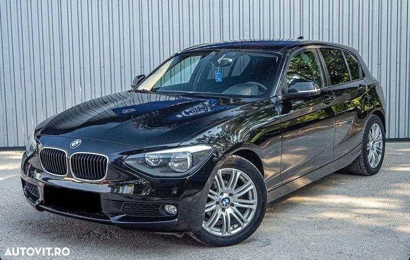 Culoarenegru Utilizat 2011 BMW 116 Hatchback | 6.300 EUR (Preț OK) - Imagine 1/4