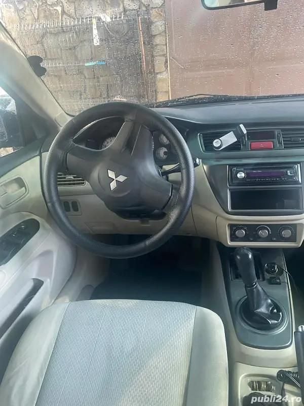 Second-hand Mitsubishi Lancer 102 CP (75 kW) 2008 Negru Berlinǎ