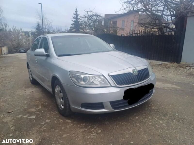 Gri Utilizat 2011 Skoda Octavia Classic Berlinǎ | 3.300 EUR (Super Preț) - Imagine 1/4