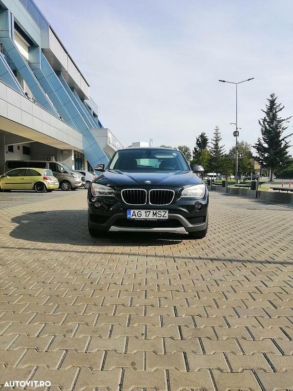 Culoarenegru Utilizat 2013 BMW X1 SUV | 7.450 EUR (Preț bun) - Imagine 1/4