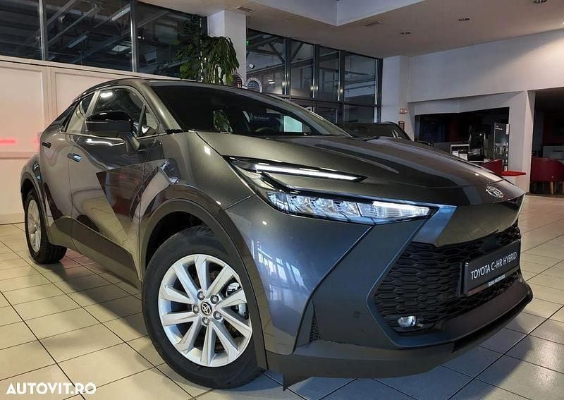 Gri Nouă 2024 Toyota C-HR Active SUV | 29.477 EUR - Imagine 1/4