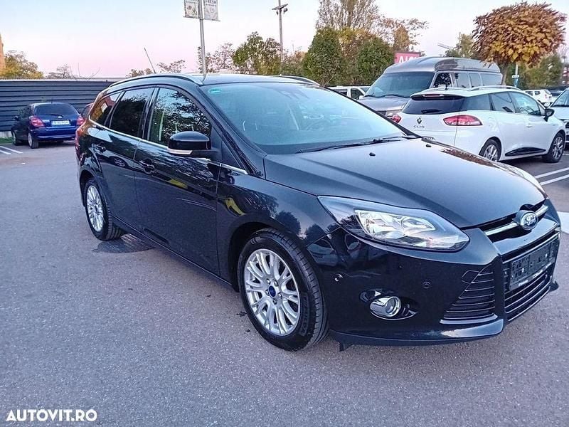Culoarenegru Utilizat 2013 Ford Focus Titanium Break | 4.690 EUR (Preț bun) - Imagine 1/4
