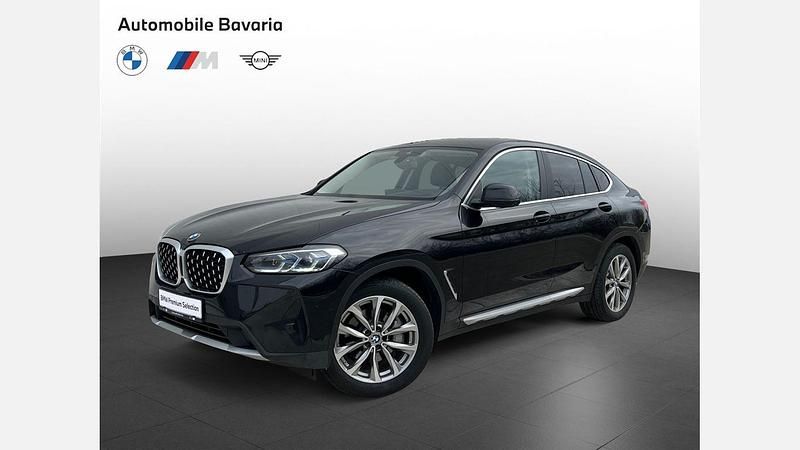 Black sapphire metallic metalizat Second-hand 2023 BMW X4 Comfort Edition SUV | 48.860 EUR (Preț OK) - Imagine 1/4