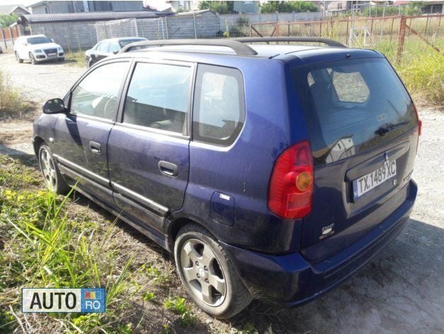 Second-hand Mitsubishi Space Star 105 CP (77 kW) 2003 Albastru Monovolum