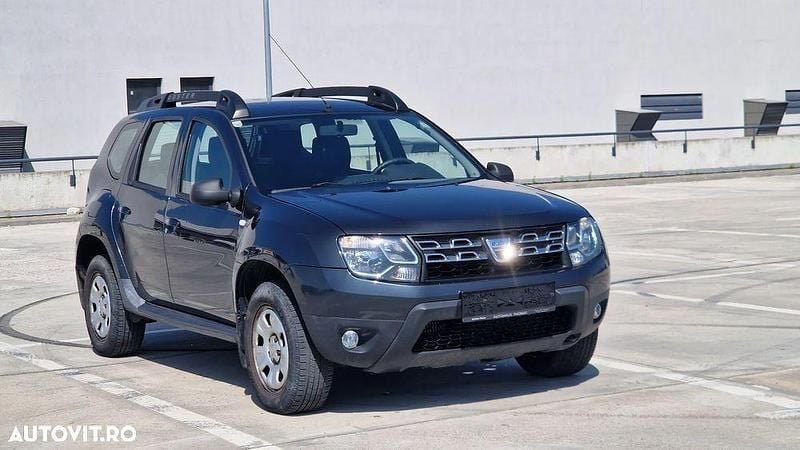 Gri Utilizat 2014 Dacia Duster Lauréate SUV | 7.050 EUR (Preț OK) - Imagine 1/4