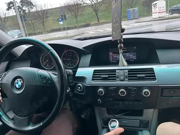 Second-hand BMW 520 177 CP (130 kW) 2009 Negru Berlinǎ