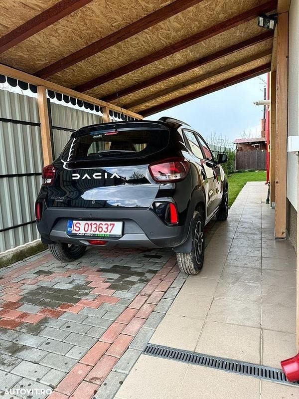 Culoarenegru Utilizat 2023 Dacia Spring Hatchback | 10.500 EUR (Preț OK) - Imagine 1/4