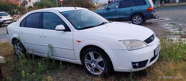 Second-hand Ford Mondeo Ghia 115 CP (84 kW) 2002 Alb Berlinǎ