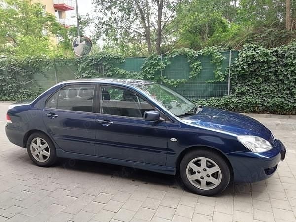 Second-hand Mitsubishi Lancer 98 CP (72 kW) 2009 Albastru Berlinǎ