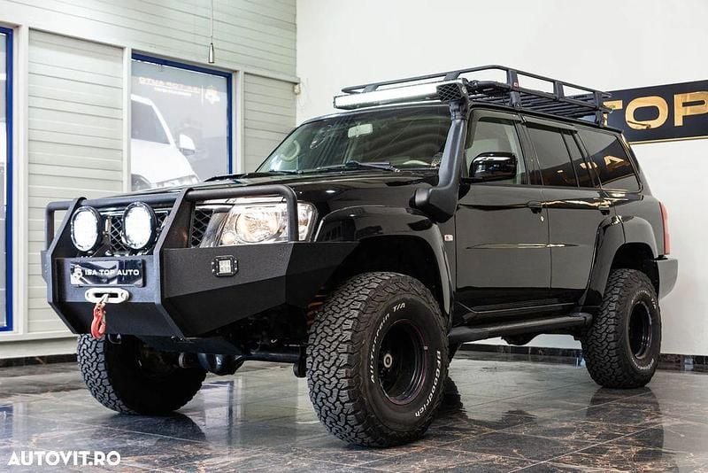 Culoarenegru Utilizat 2005 Nissan Patrol SUV | 24.999 EUR (Preț OK) - Imagine 1/4